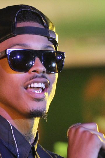 August Alsina is seen performing on stage at 2014 Essence Music Festival Concert - Day 4 at Superdome on Sunday, July 06, 2014 in New Orleans, LA. (Photo by Donald Traill/Invision/AP)